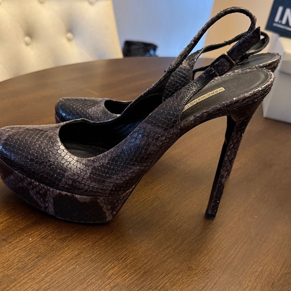 Vera Wang Lavender Snakeskin Platform Heels
5” slightly over heel - Picture 3 of 6